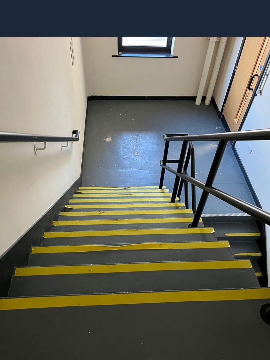 Communal stairwell and landing prepared for a deep clean