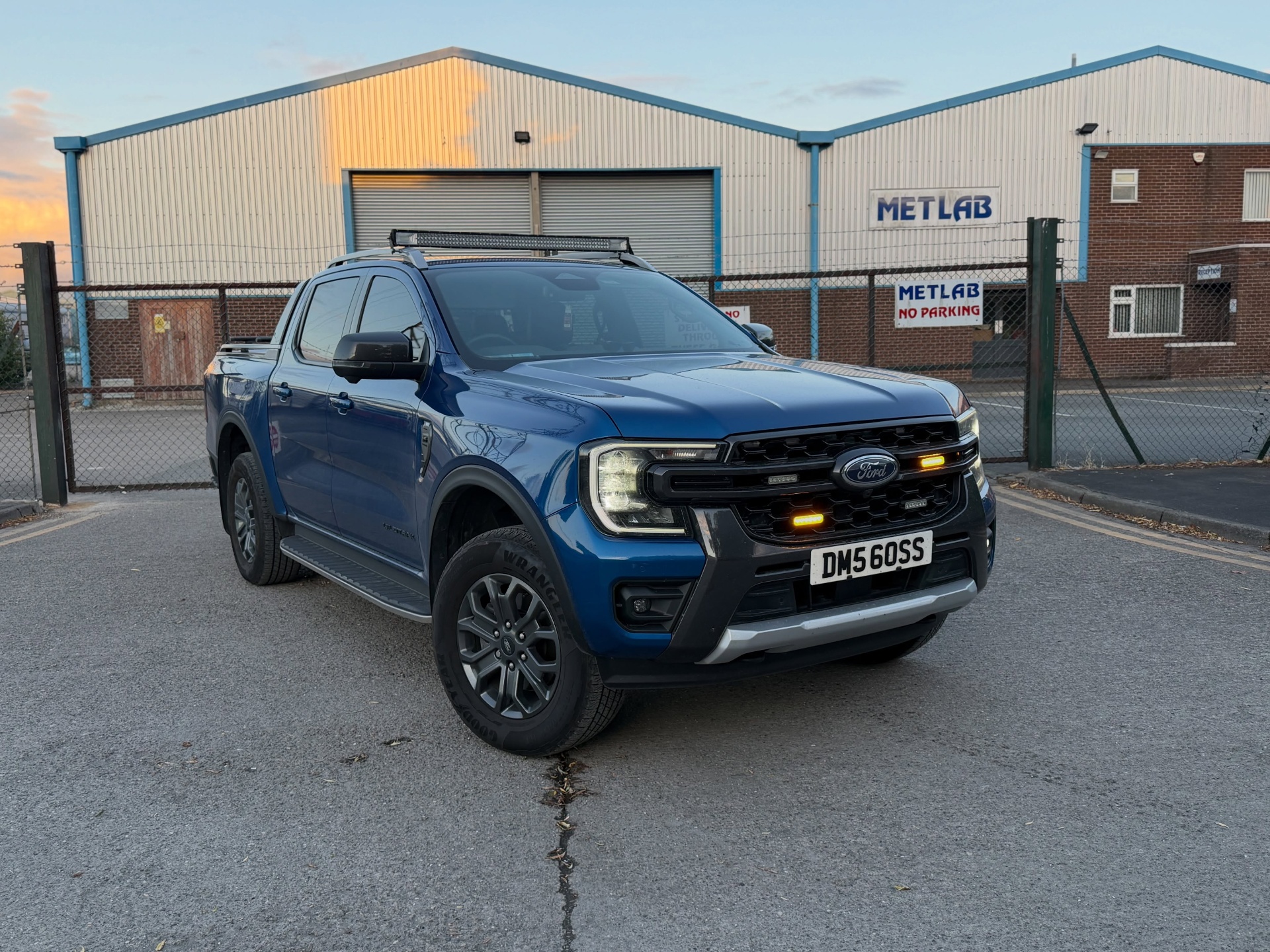 DMS pickup truck on site at a commercial property
