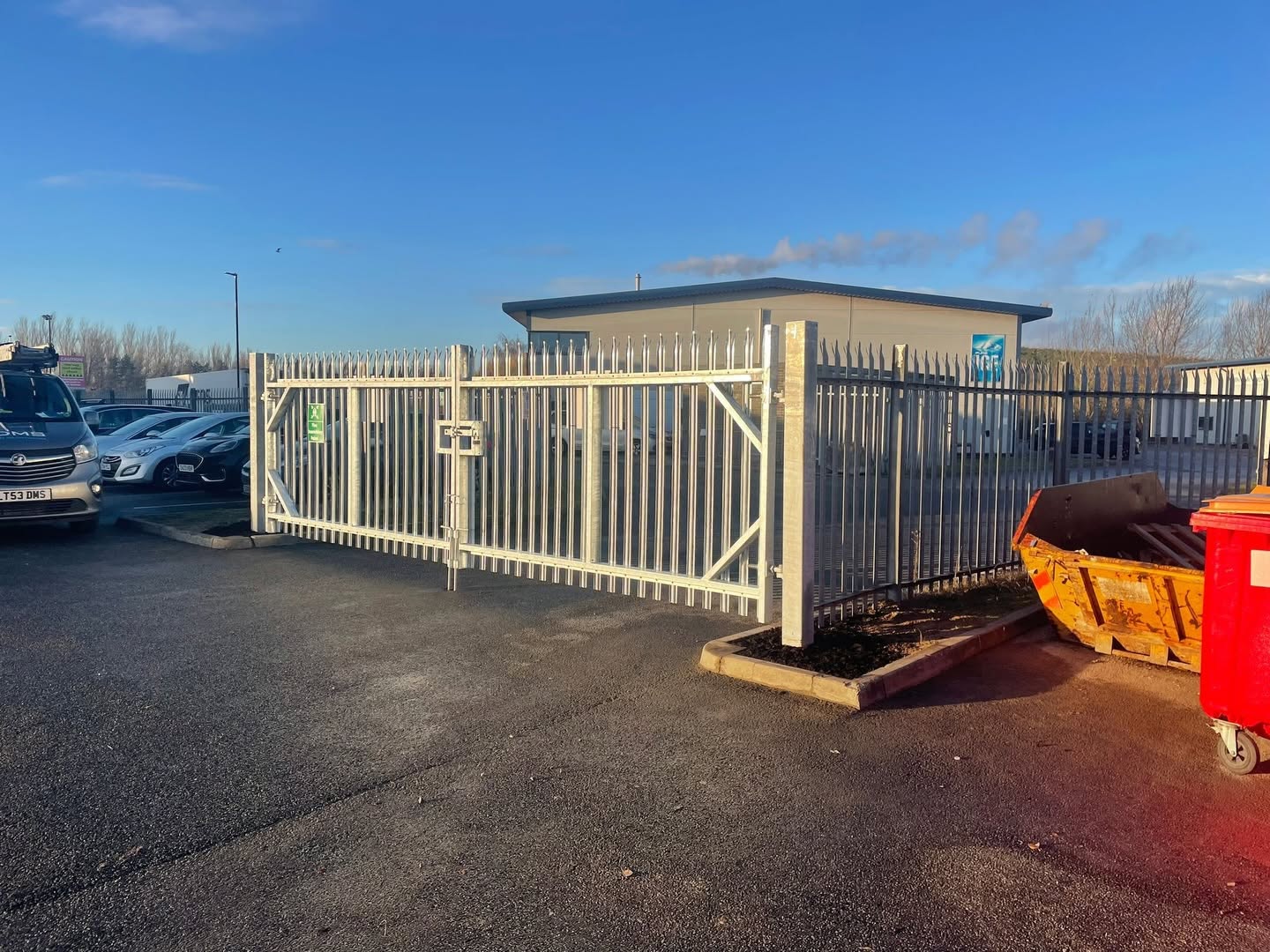 Industrial security gate secured with a new lock and latch